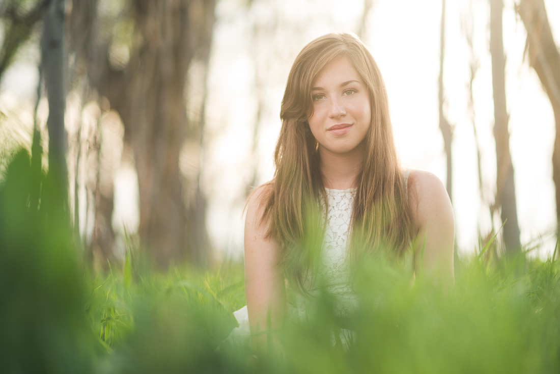 denver high school senior photo in grass