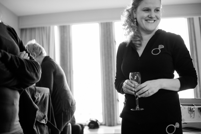 downtown denver wedding photography bride drinking champagne