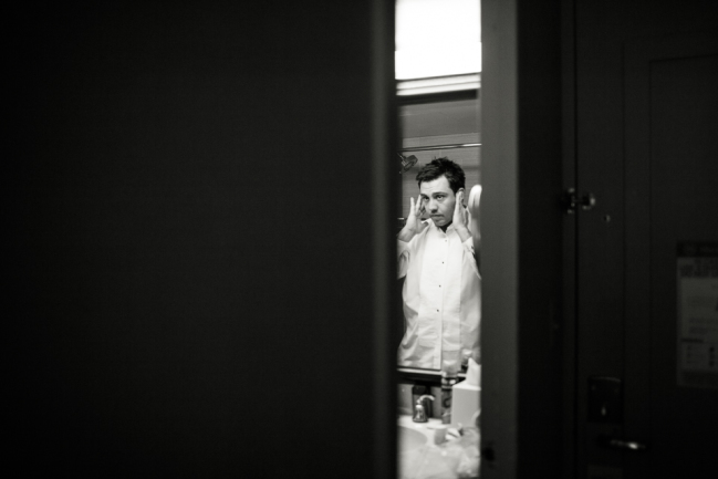 downtown denver wedding photography groom getting ready