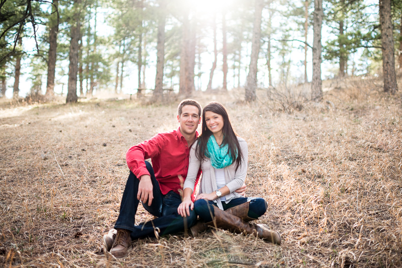 Evergreen engagement photography happy couple in a forest