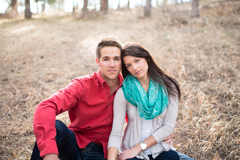 Evergreen engagement photography happy couple in a forest