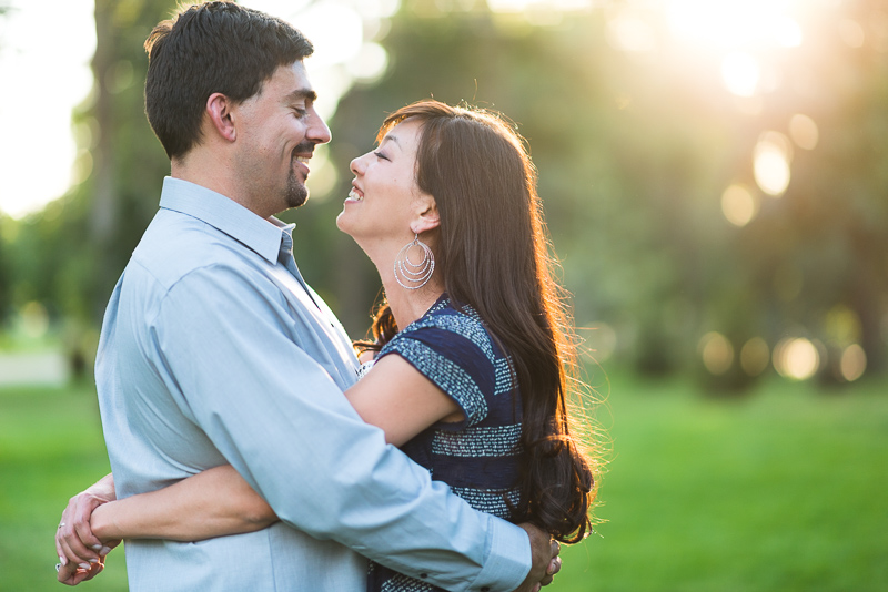 Denver Engagement Photographer couple laughing in sunny park