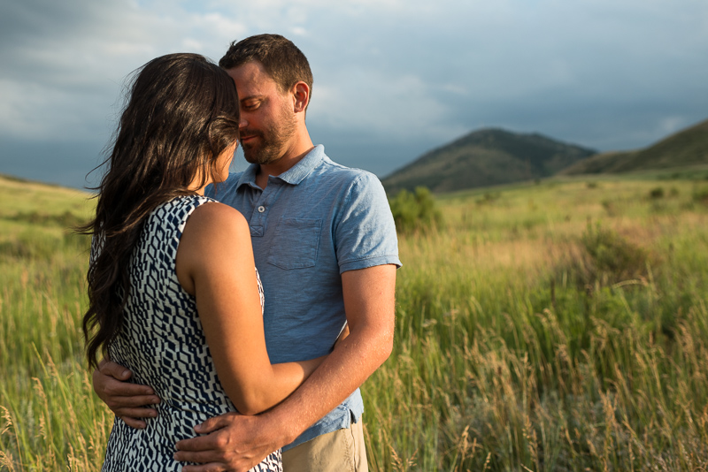 Golden Engagement Photography couple in grass