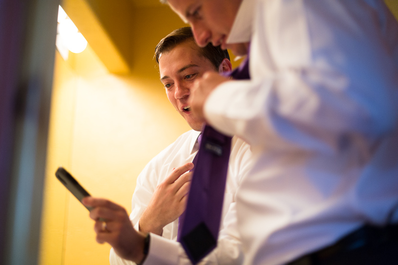 Golden Wedding Photographer guys tying ties