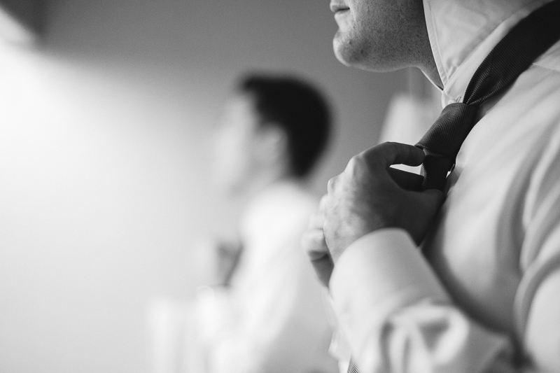Golden Wedding Photographer guys tying ties