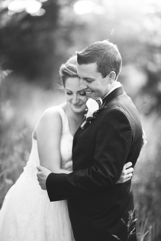 Golden Wedding Photographer black and white smiling couple