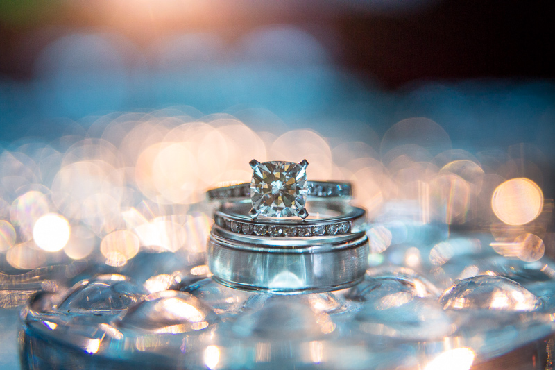 Golden Wedding Photographer ring shot bokeh