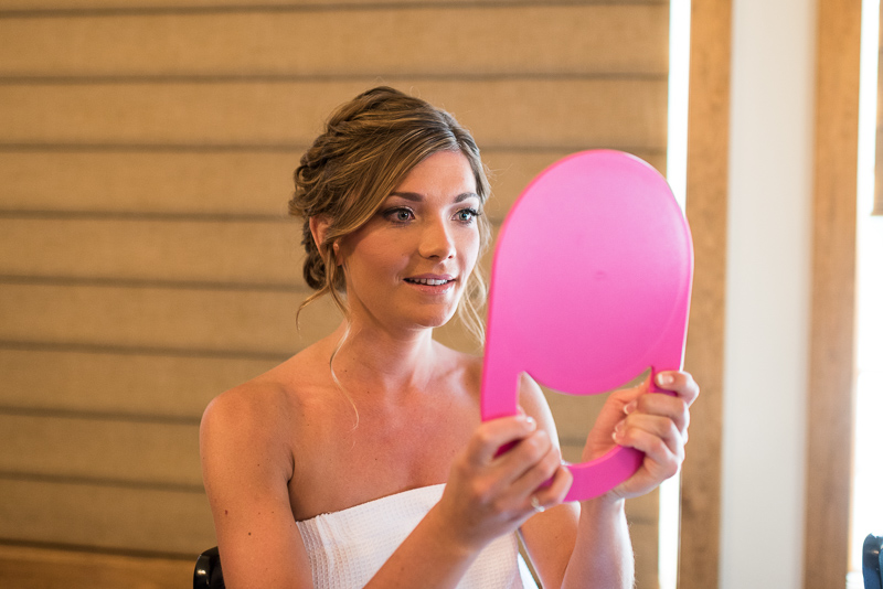 Silverthorne Wedding Photographer bride looking into mirror
