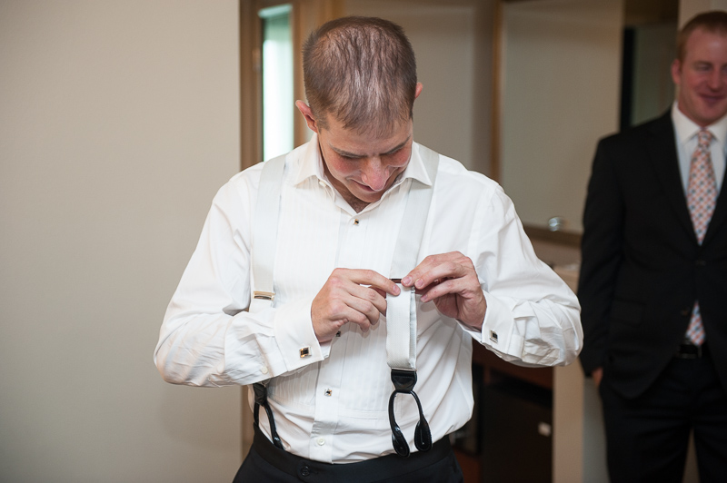Denver Opera House Wedding Photographer groom getting ready
