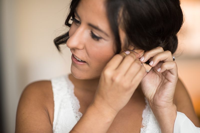 Denver Wedding Photography History Colorado bride putting on earrings