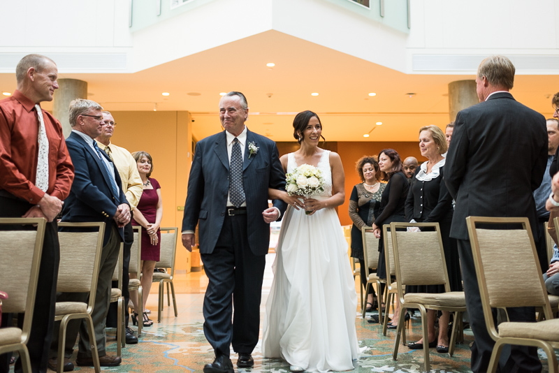 Denver Wedding Photography History Colorado bride walking down aisle