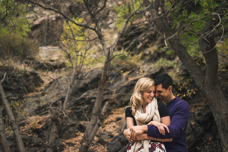 Golden Engagement Photography laughing couple hugging