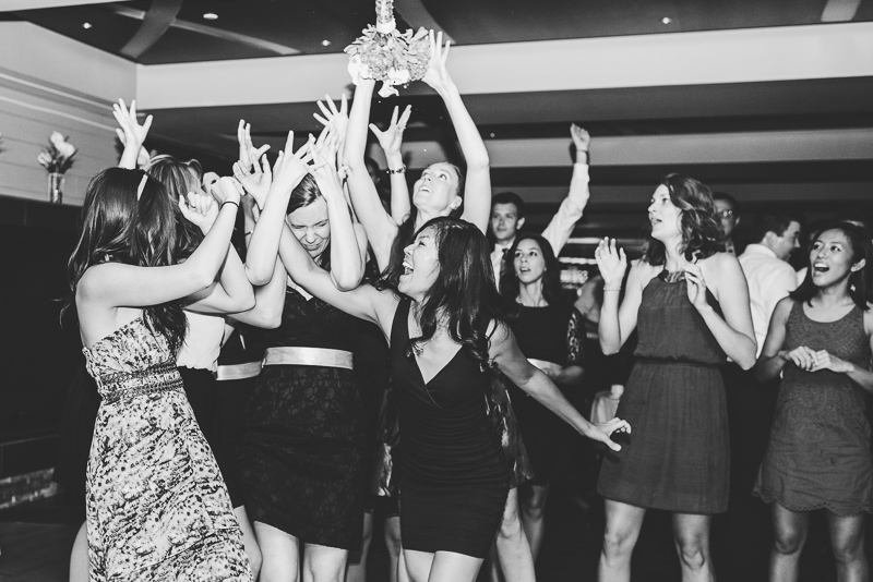Denver wedding photography crazy bouquet toss