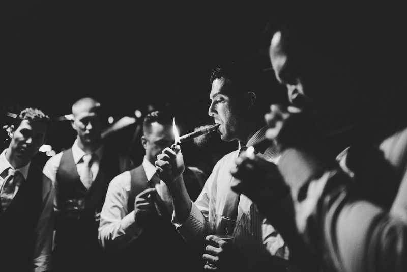 Denver wedding photography guys lighting cigars