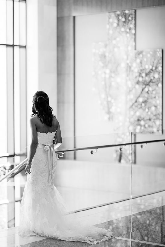 Denver Wedding Photography bride walking down stairs four seasons hotel