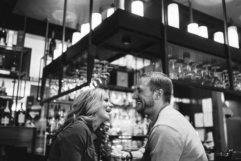 Denver Engagement Photography laughing in bar