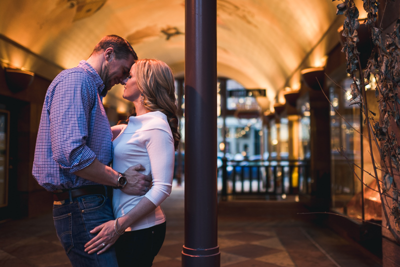 Denver Engagement Photography kissing in arch