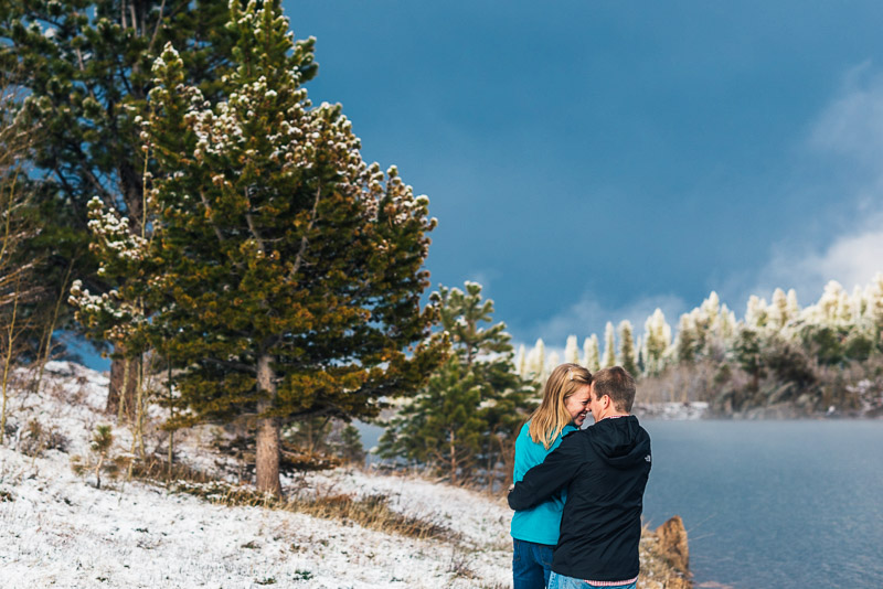 Boulder Engagement Photography pine trees snow lake