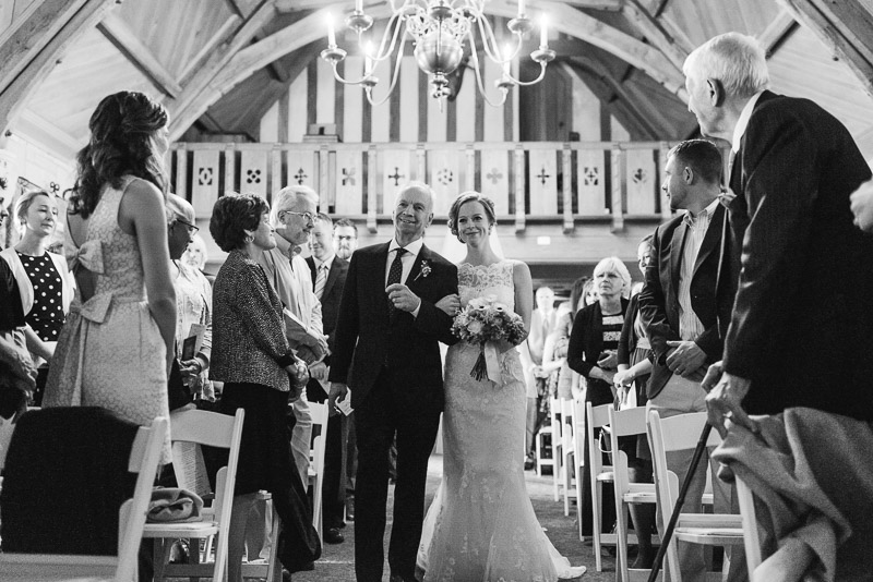 Denver Wedding Photography Cherokee Ranch and Castle bride walking down aisle