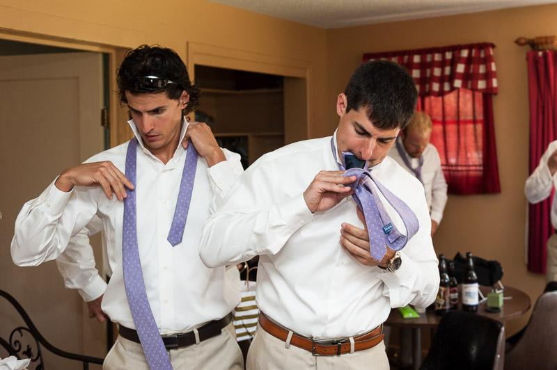 Emily and Ryan Lower Lake Ranch Wedding Photography groom tying tie