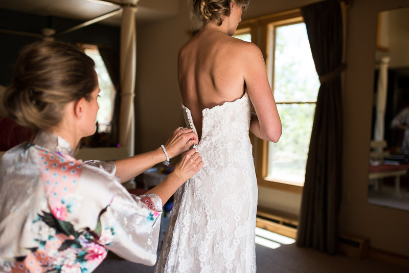 Emily and Ryan Lower Lake Ranch Wedding Photography bride getting dressed