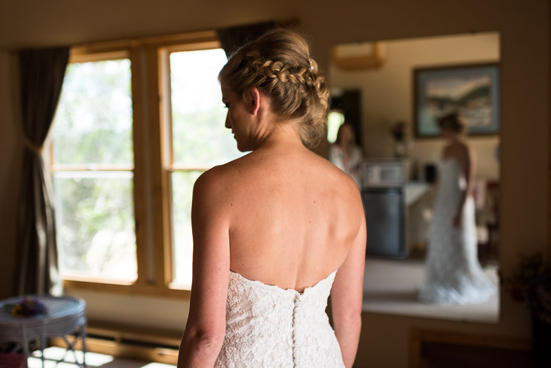 Emily and Ryan Lower Lake Ranch Wedding Photography bride getting dressed