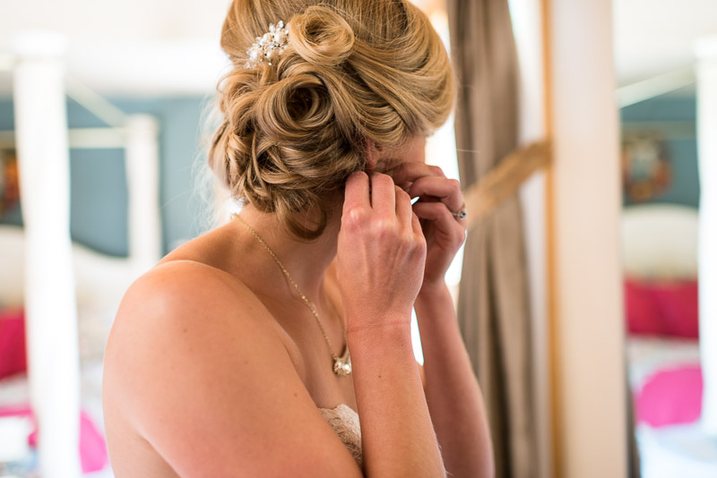 Emily and Ryan Lower Lake Ranch Wedding Photography bride earrings