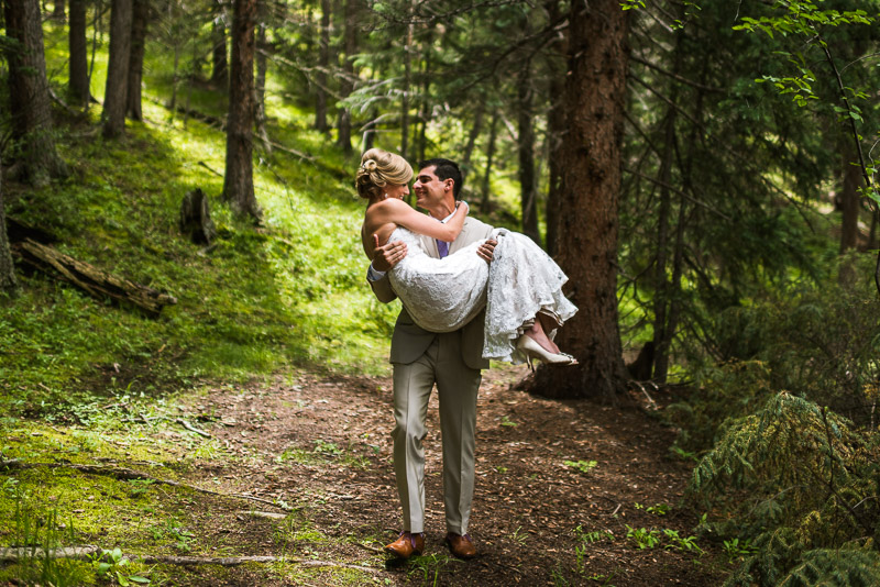 Emily and Ryan Lower Lake Ranch Wedding Photography groom carrying bride