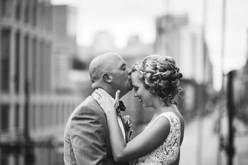 Denver athletic club wedding classic kissing black and white