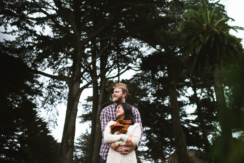 San Francisco engagement photography alamo square hugging couple
