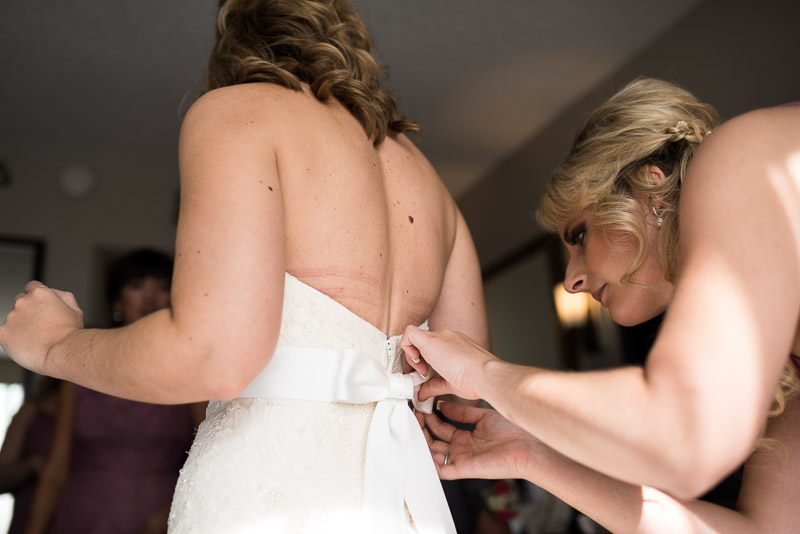 San Jose wedding photography bride getting dressed