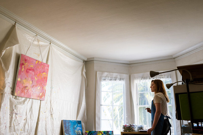 Chloe san francisco abstract expressionism painter looking at painting
