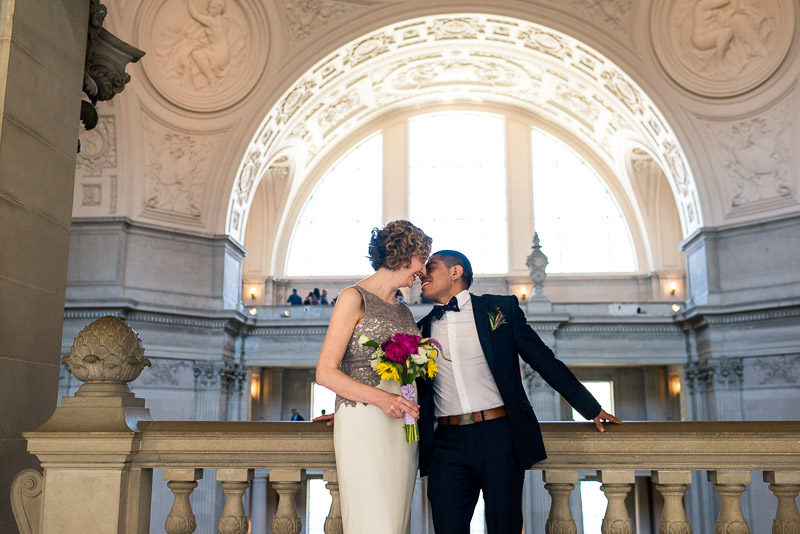 san francisco city hall wedding kissing couple