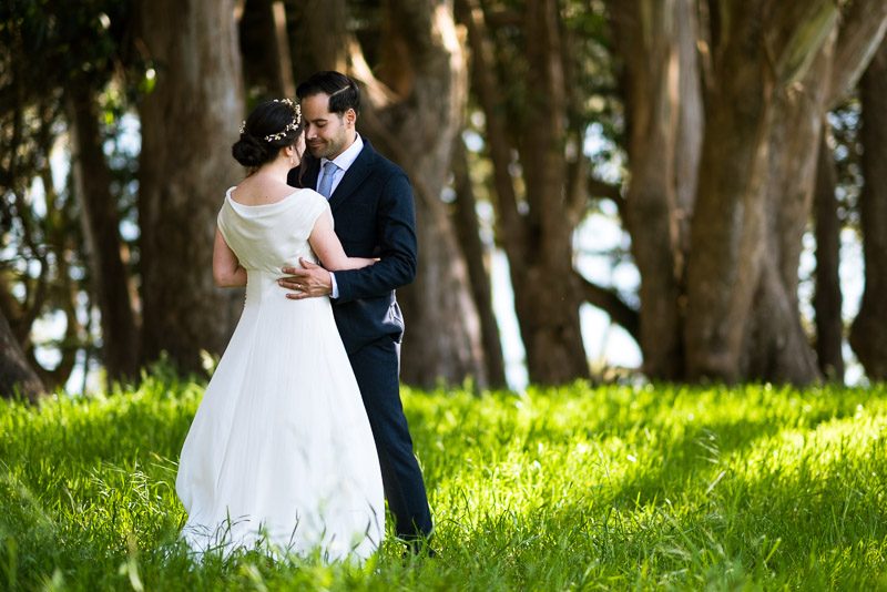 Strauss home ranch wedding couple in grass