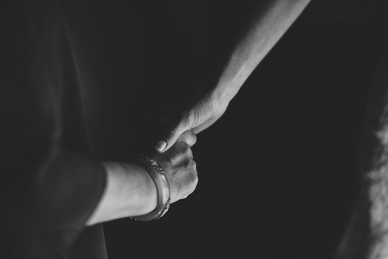 Vail Wedding Photography Camp Hale bride holding hands with mother